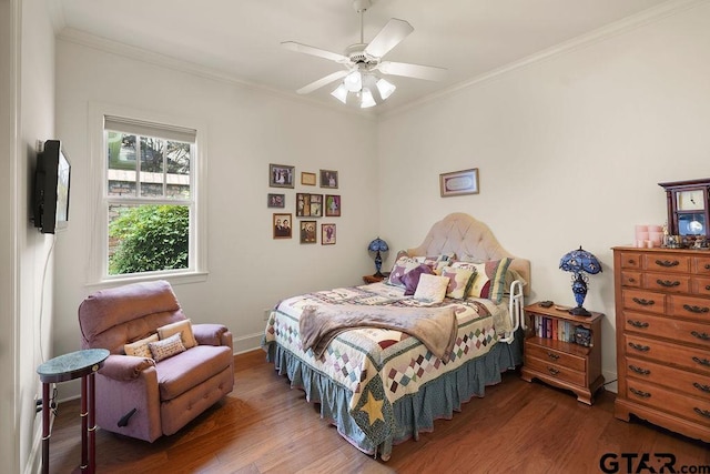 4007 Spartanburg Ln, Tyler, TX 75701 - bedroom with wood finished floors, crown molding, a ceiling fan, and baseboards