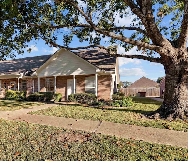 view of front of home with a front yard