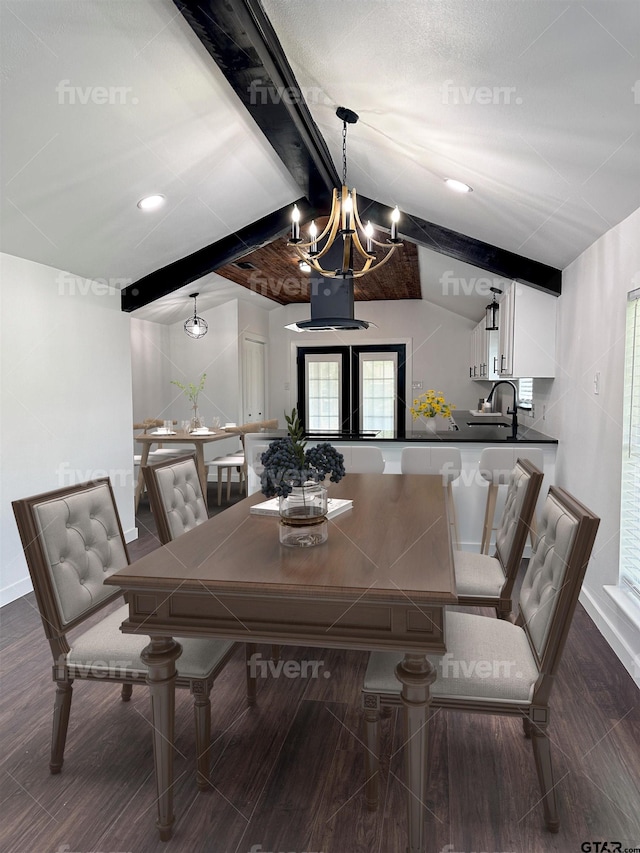 dining space featuring dark hardwood / wood-style flooring, a chandelier, sink, and vaulted ceiling with beams