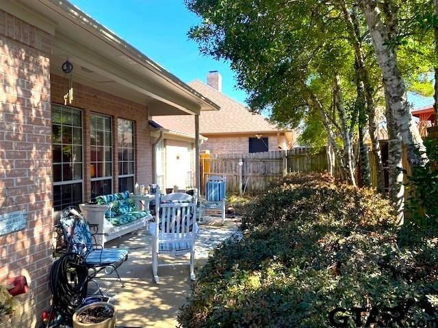 view of patio / terrace with fence