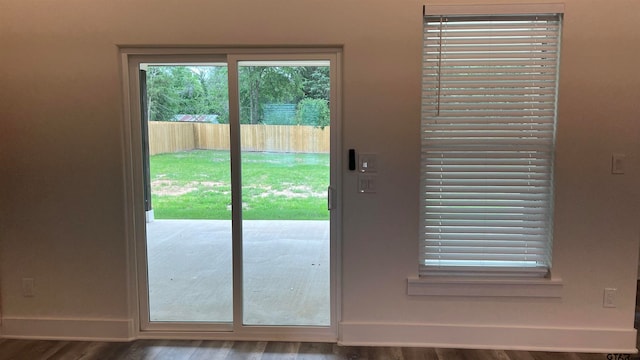 doorway to outside featuring hardwood / wood-style floors