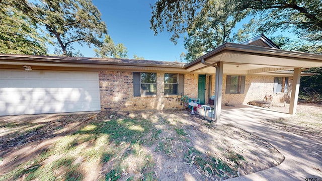 single story home featuring a garage