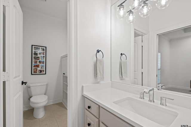 bathroom featuring vanity, baseboards, tile patterned floors, toilet, and a chandelier