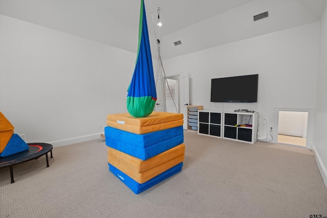 playroom featuring baseboards, visible vents, and carpet floors