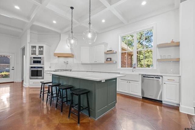 kitchen with open shelves, custom range hood, stainless steel appliances, white cabinetry, and a sink