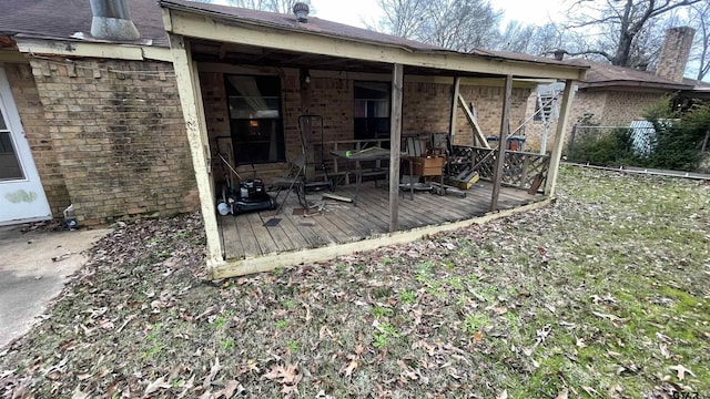 rear view of property with a deck