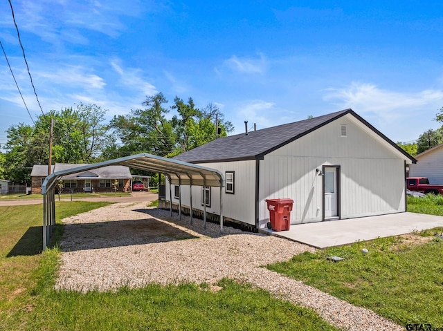 924 Kaufman St, Mount Vernon, TX 75457 - view of outbuilding with a detached carport