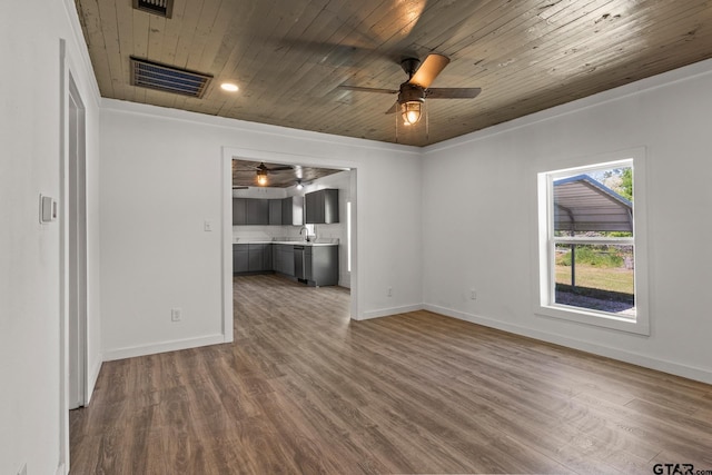 924 Kaufman St, Mount Vernon, TX 75457 - unfurnished room with wood ceiling, wood finished floors, ceiling fan, and visible vents