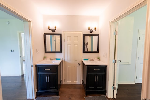 bathroom featuring hardwood / wood-style floors and vanity