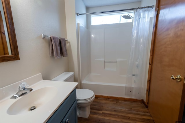 full bathroom with vanity, toilet, wood-type flooring, and shower / tub combo with curtain