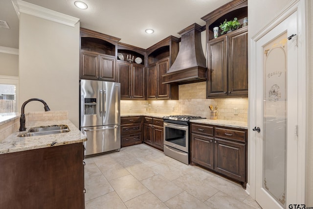 kitchen with crown molding, appliances with stainless steel finishes, open shelves, a sink, and custom range hood