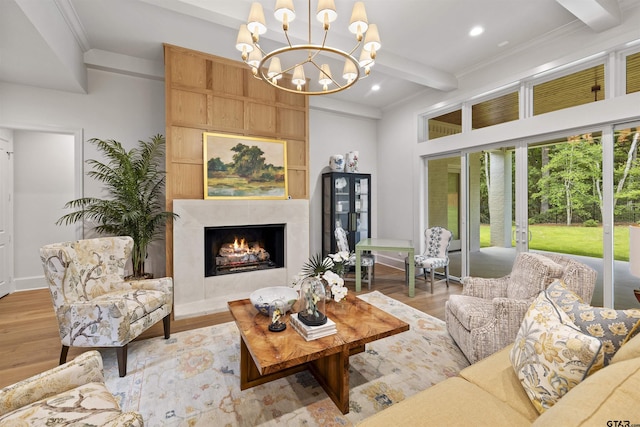 8810 Wilder Trl, Tyler, TX 75703 - living area with beam ceiling, a chandelier, ornamental molding, wood finished floors, and recessed lighting