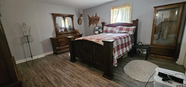 7506 Romans Rd, Athens, TX 75751 - bedroom with dark wood-style flooring and baseboards