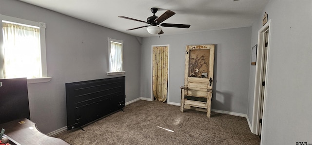 7506 Romans Rd, Athens, TX 75751 - bedroom with carpet floors, a ceiling fan, and baseboards