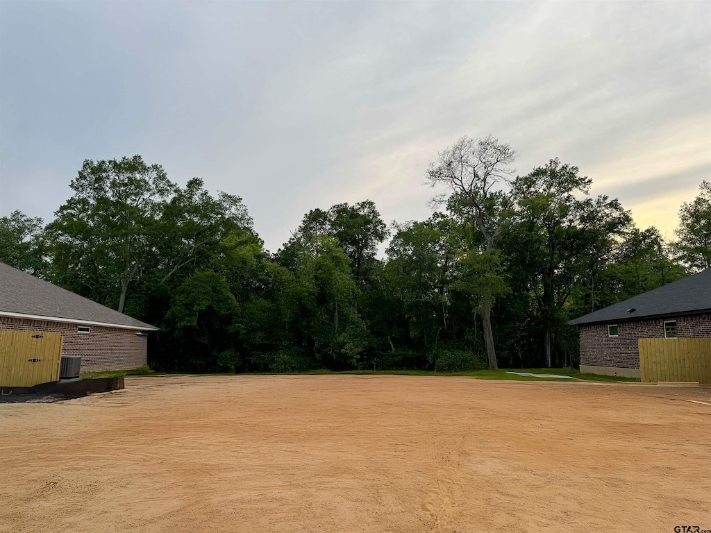 view of yard featuring central AC unit