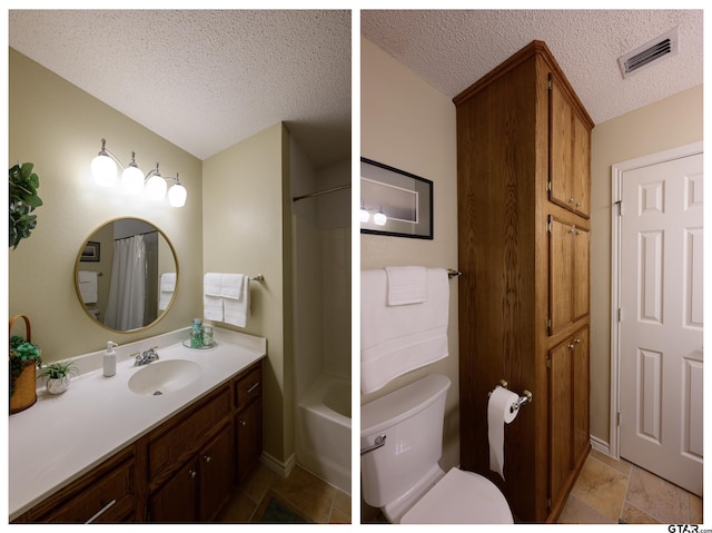 bathroom with vanity, toilet, a textured ceiling, and visible vents