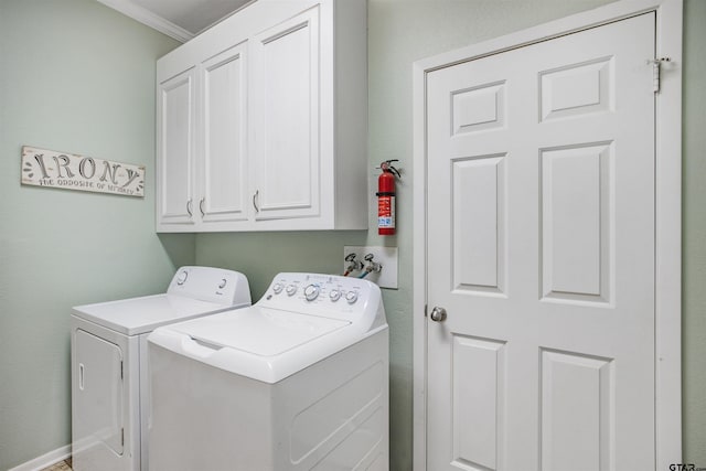 18058 Whispering Pines Rd, Flint, TX 75762 - washroom featuring cabinet space, washing machine and clothes dryer, and ornamental molding