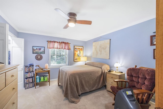 18058 Whispering Pines Rd, Flint, TX 75762 - bedroom with ornamental molding, light carpet, and ceiling fan