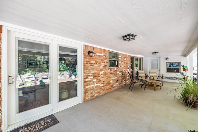 18058 Whispering Pines Rd, Flint, TX 75762 - porch featuring a baseboard radiator