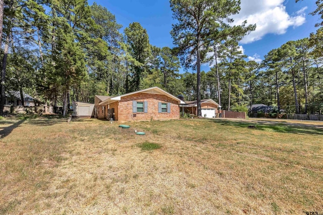 18058 Whispering Pines Rd, Flint, TX 75762 - view of side of home with brick siding