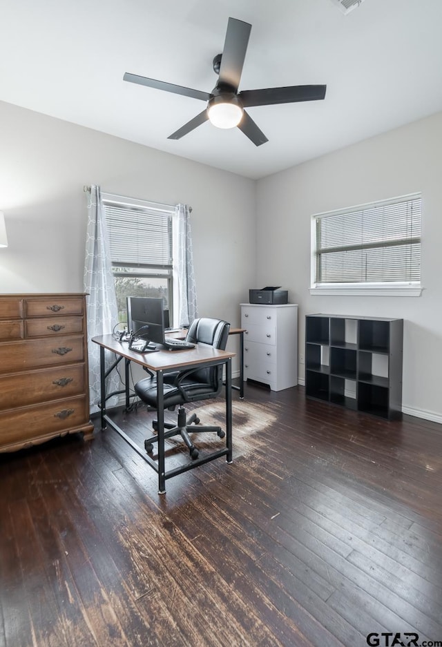 office with dark hardwood / wood-style flooring and ceiling fan