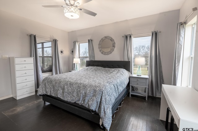 bedroom featuring ceiling fan and dark hardwood / wood-style flooring