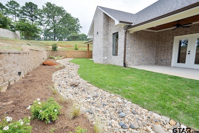 9244 Villas Ct, Tyler, TX 75703 - view of yard featuring a ceiling fan, a patio area, and french doors