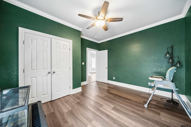 811 W 27th St, Tyler, TX 75702 - unfurnished office featuring ceiling fan, wood finished floors, ornamental molding, and baseboards
