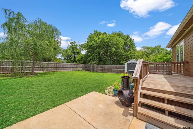 811 W 27th St, Tyler, TX 75702 - view of yard with a patio area, a storage shed, a deck, and an outbuilding