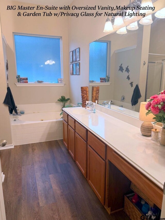 12260 Wild Horse, Tyler, TX 75706 - bathroom featuring wood finished floors, a jetted tub, vanity, and a shower stall