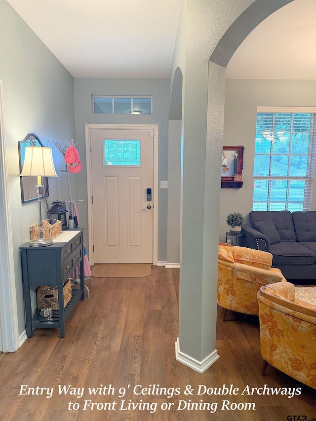 12260 Wild Horse, Tyler, TX 75706 - entryway featuring arched walkways and wood finished floors