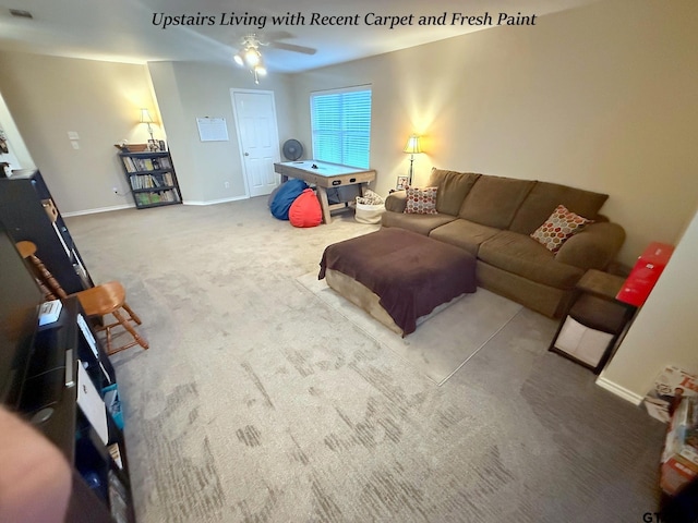 12260 Wild Horse, Tyler, TX 75706 - carpeted living room featuring a ceiling fan and baseboards