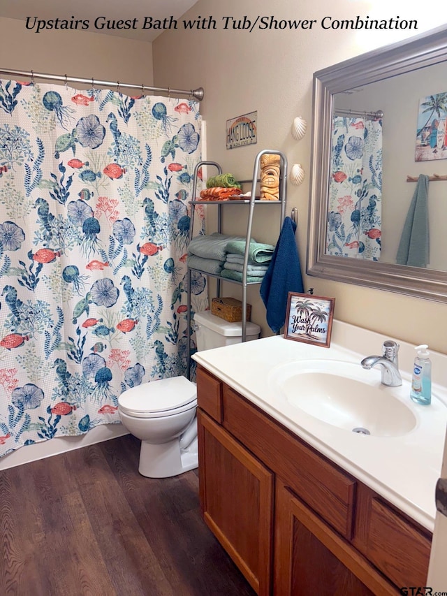 12260 Wild Horse, Tyler, TX 75706 - full bath with vanity, wood finished floors, and curtained shower