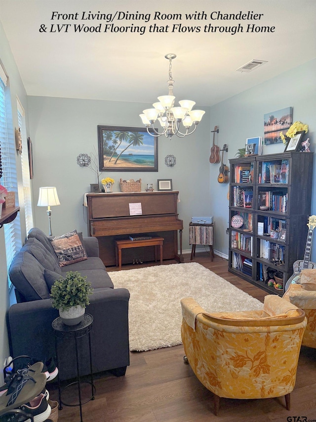 12260 Wild Horse, Tyler, TX 75706 - living area featuring a chandelier and wood finished floors