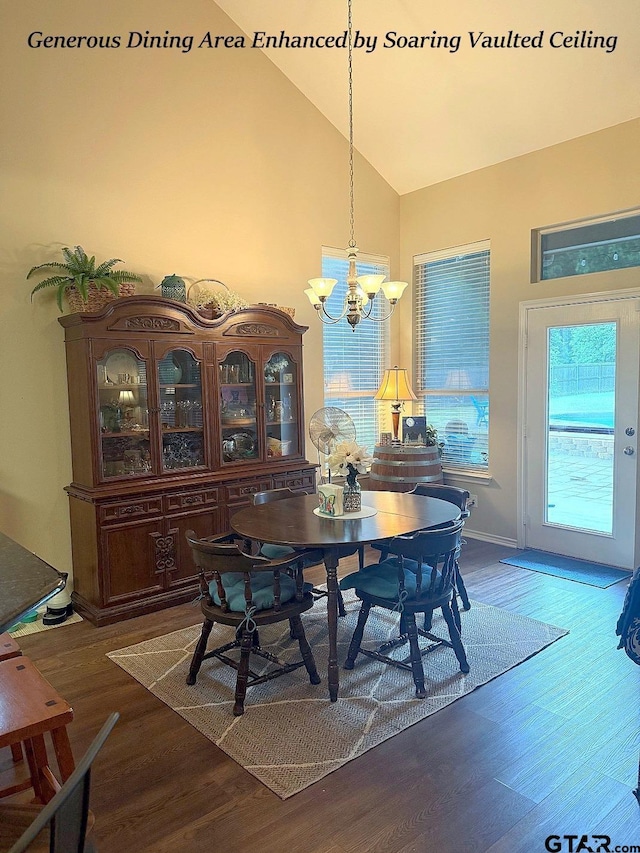 12260 Wild Horse, Tyler, TX 75706 - dining space featuring wood finished floors, a chandelier, and high vaulted ceiling