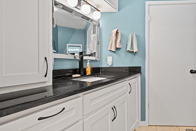 bathroom with vanity and tile patterned floors