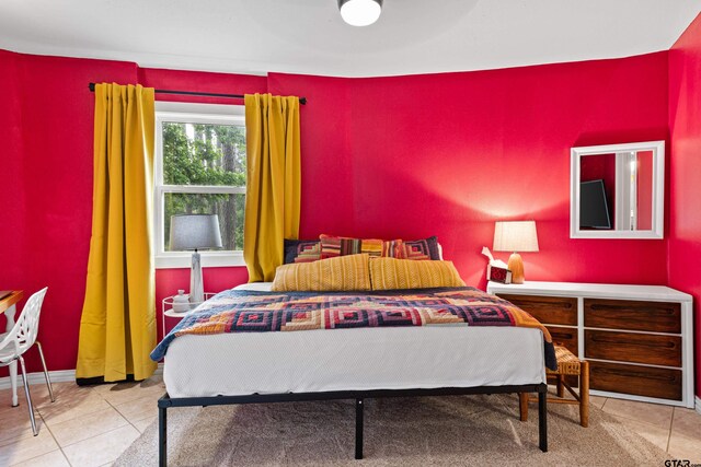 bedroom featuring tile patterned flooring