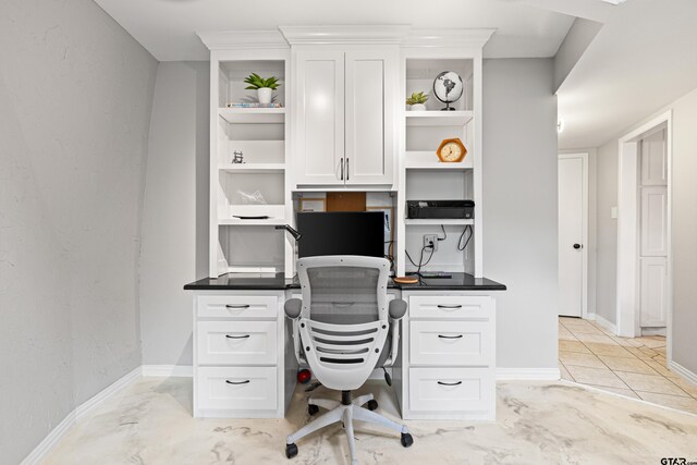 home office featuring baseboards