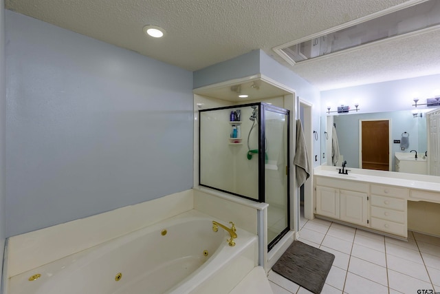 bathroom with vanity, tile patterned floors, separate shower and tub, and a textured ceiling