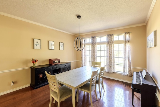 dining space featuring a textured ceiling, dark hardwood / wood-style flooring, and ornamental molding