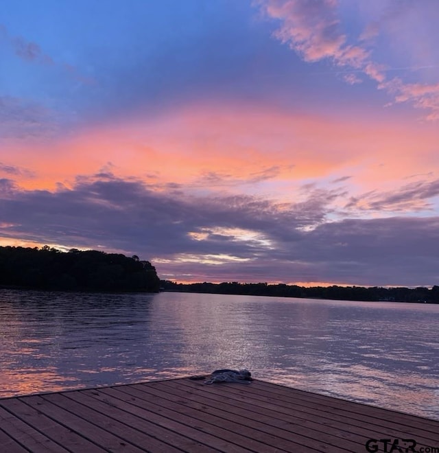 view of dock with a water view