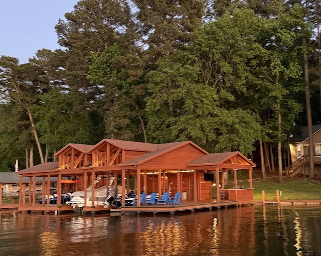 dock area with a water view