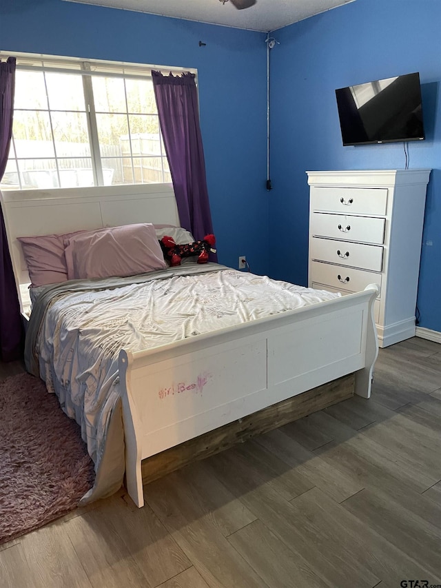 bedroom featuring hardwood / wood-style floors