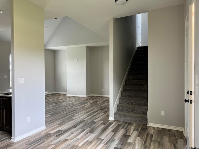 stairway featuring hardwood / wood-style floors