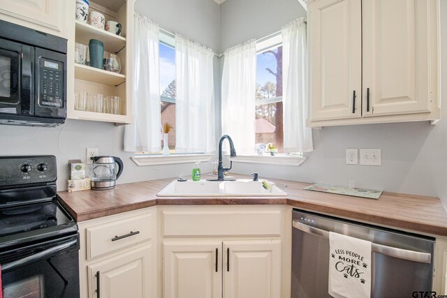 18424 Whipporwill, Flint, TX 75762 - kitchen with black appliances, wood counters, a sink, and open shelves