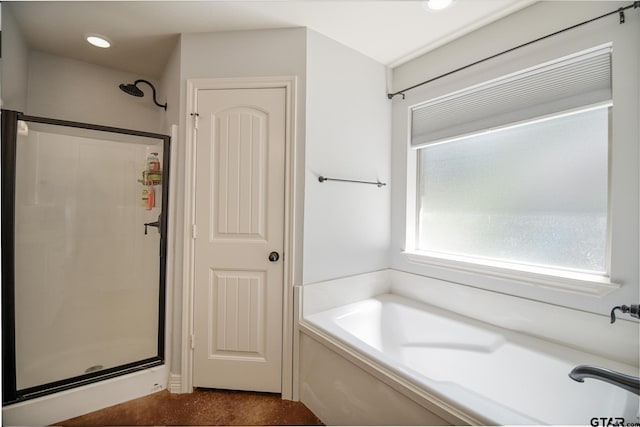 18424 Whipporwill, Flint, TX 75762 - bathroom with a stall shower, a bath, and recessed lighting