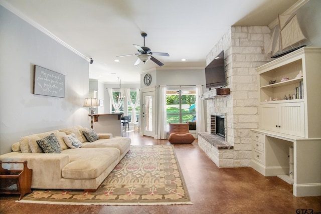 18424 Whipporwill, Flint, TX 75762 - living room featuring a stone fireplace, a ceiling fan, ornamental molding, recessed lighting, and finished concrete flooring