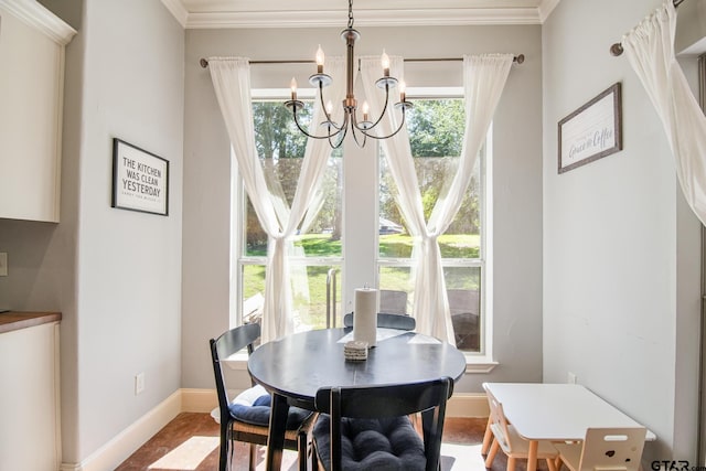 18424 Whipporwill, Flint, TX 75762 - dining space with a chandelier, baseboards, and ornamental molding