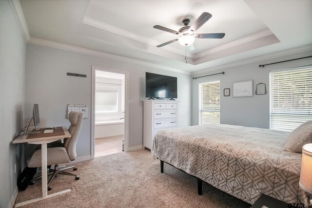 18424 Whipporwill, Flint, TX 75762 - carpeted bedroom with a tray ceiling, crown molding, a desk, a ceiling fan, and connected bathroom