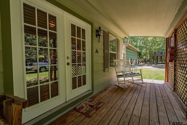 wooden deck featuring a porch